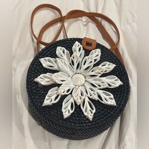 NWT Amerii Round Black Woven Rattan Crossbody Bag with White Shell Flower